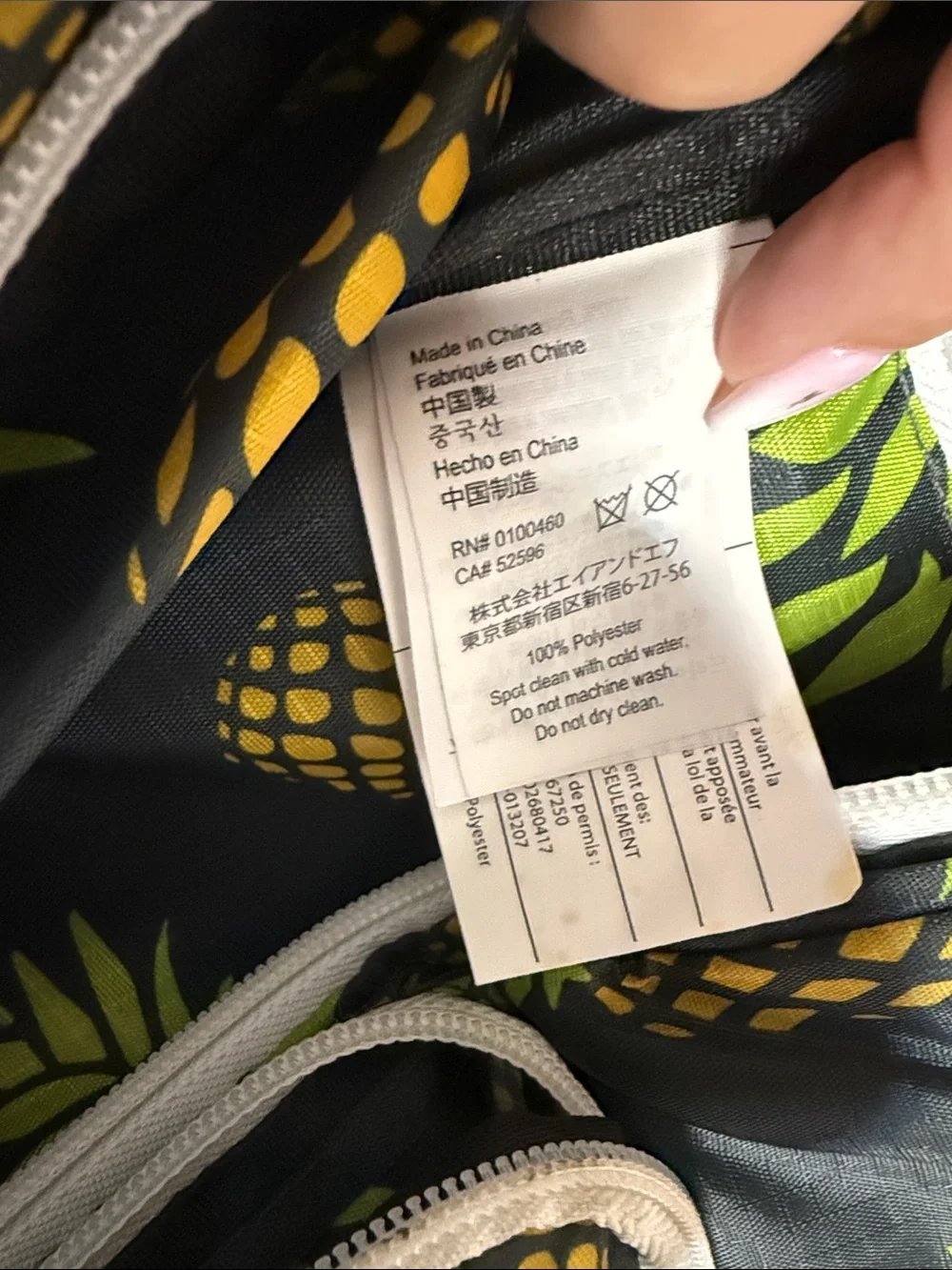 Kavu Black Sling Bag with Yellow Pineapple Print